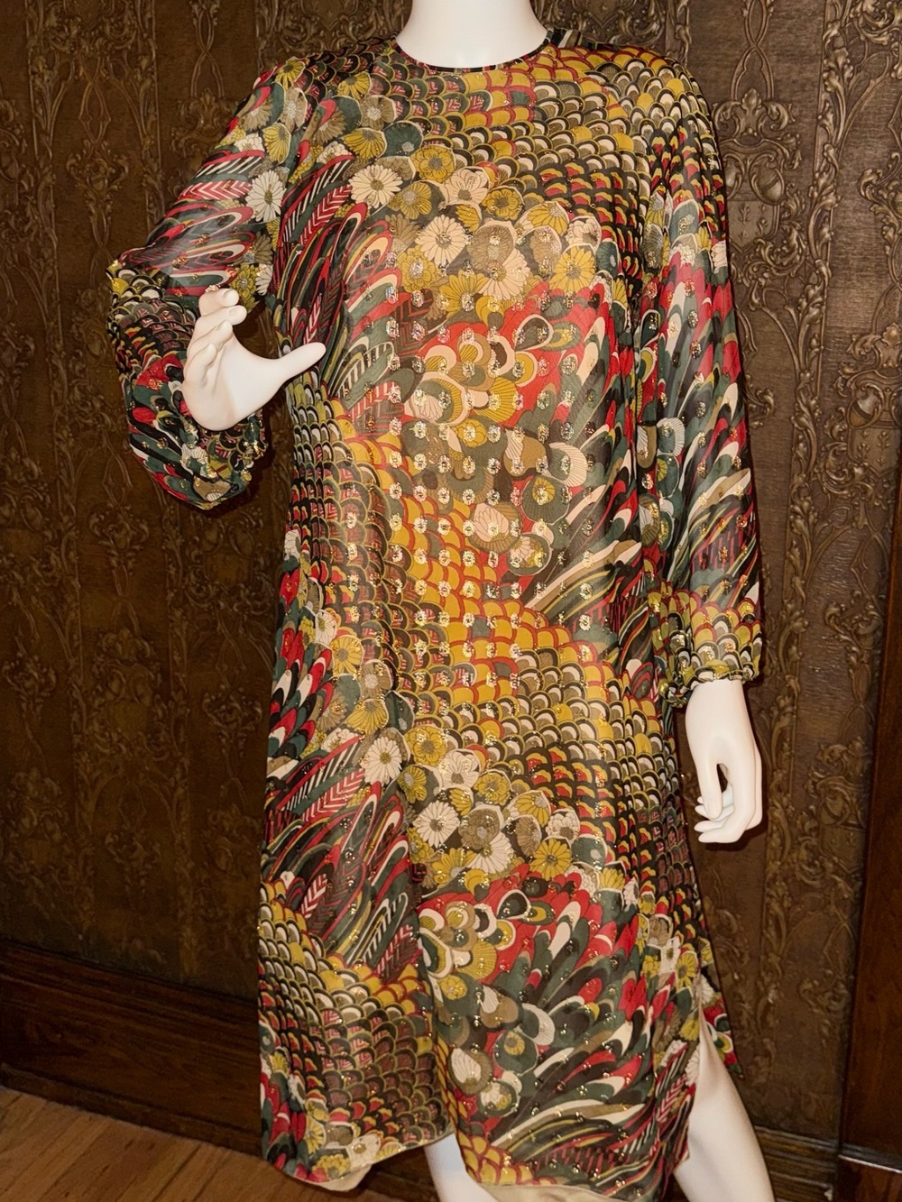 Vintage late 1960s to early 1970s peacock feather and floral print dress